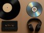 Vinyl records and digital audio equipment side by side illustrating analogue vs digital music