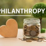 Betsy DeVos engaging in philanthropic activities to support community development initiatives