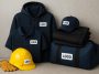 Branded workwear bundles with custom logos for trades and construction displayed on clothing.